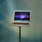 macbook-air-old-model-standing-on-table.jpg