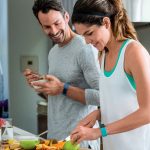 Fitbit-Charge-2_Couple_Kitchen_Lifestyle.jpg