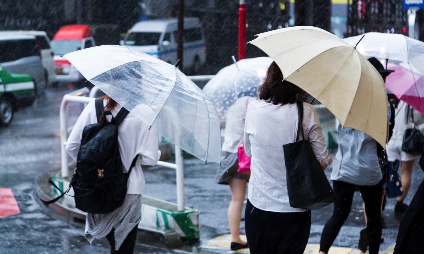 Using-an-umbrella-on-a-rainy-day.jpg