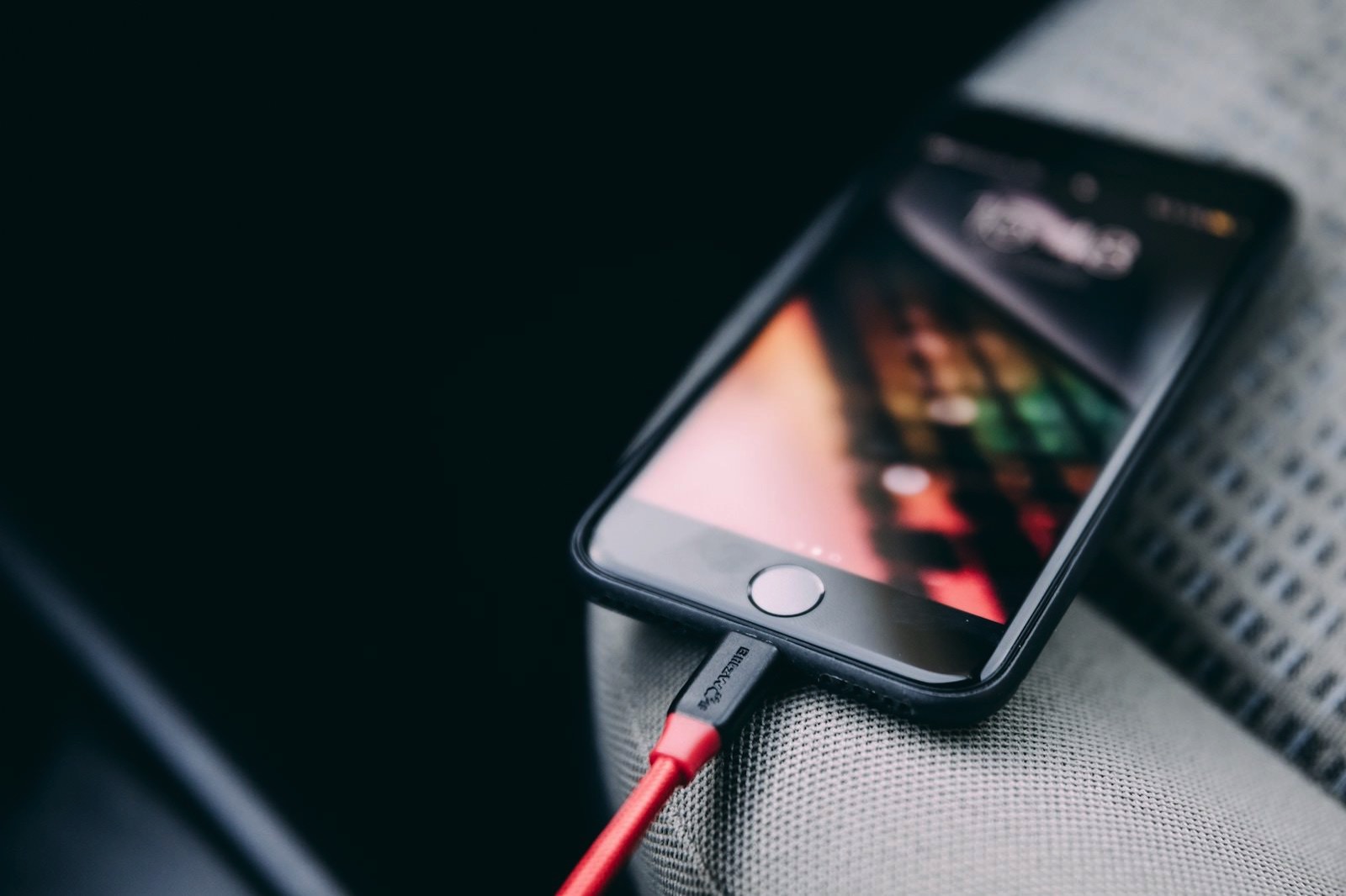 bence-boros-526291-unsplash-iphone-charging-with-cable.jpg