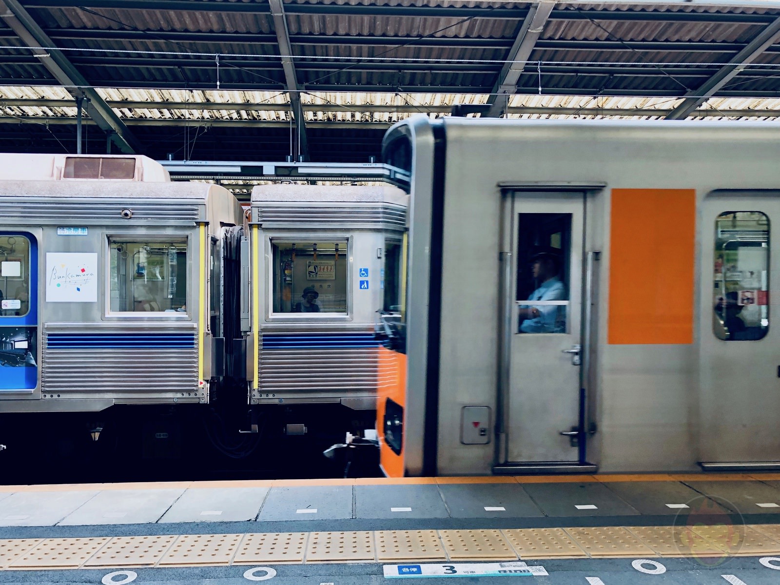Train-at-a-station-01.jpg