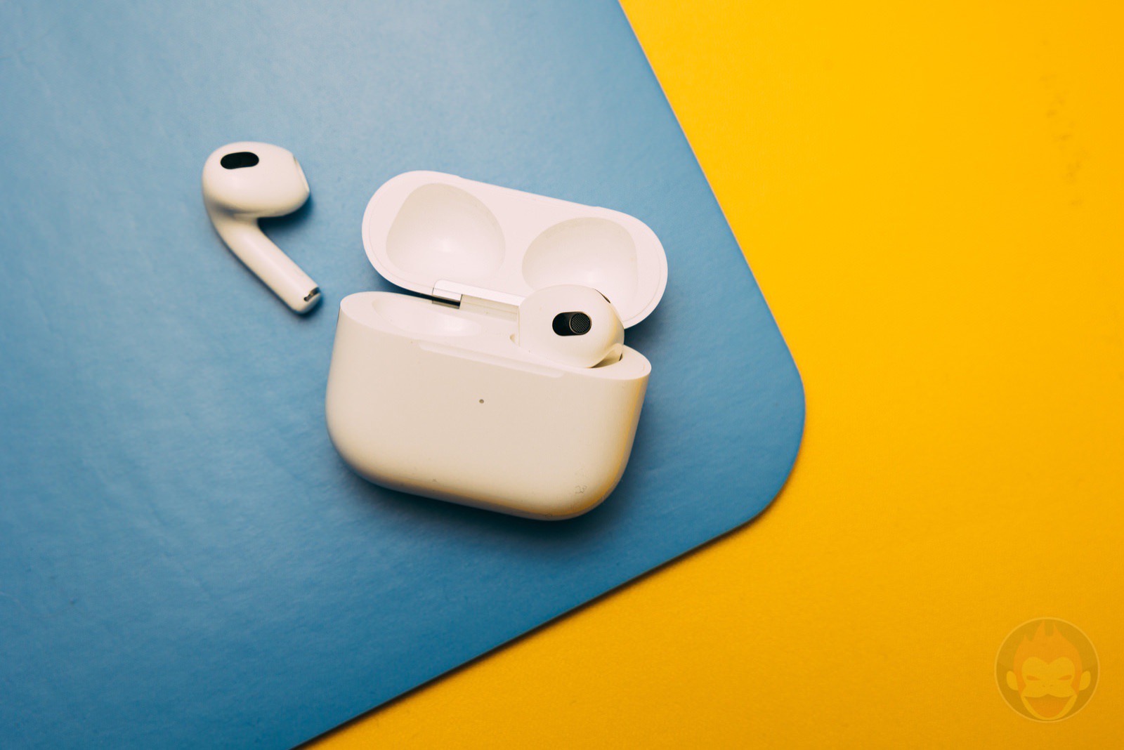 AirPods 3 with blue and yellow background 01
