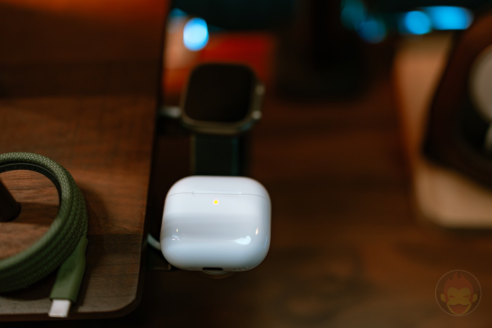 Charging AppleWatch and airpods on desk shelf 1.