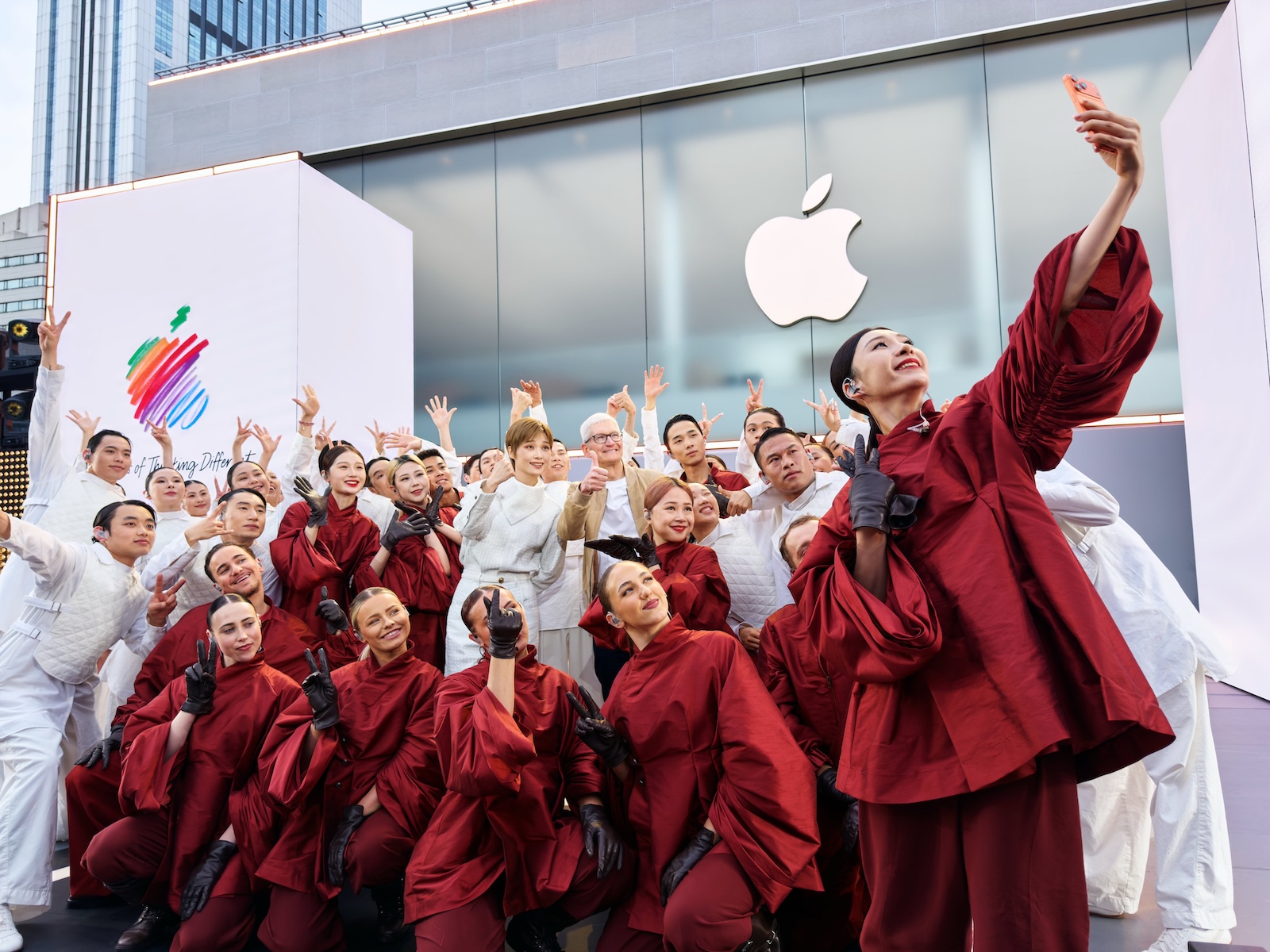 Apple 50 year anniversary Chengdu Chris Lee and dancers selfie with CEO Tim Cook